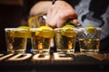 Barman pours tequila closeup club