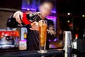 Barman prepares cocktail at the night club Royalty Free Stock Photo