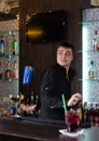 Barman serving a customer