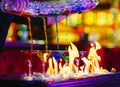 Barman show. Bartender pours alcoholic cocktails on the bar Royalty Free Stock Photo