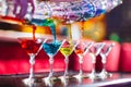 Barman show. Bartender pours alcoholic colorful cocktails. Royalty Free Stock Photo