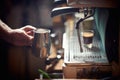 A barman is using an espresso apparatus. Coffee, beverage, bar Royalty Free Stock Photo