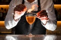 Barman making an alcoholic drink with a smoky note Royalty Free Stock Photo