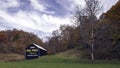 Rural autumn landscape with mail pouch barn