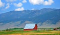 Barn Backed by Mountains Royalty Free Stock Photo