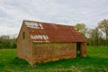 Barn. Brick built tin roof.