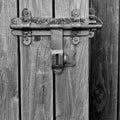 Barn door sliding bar / lock detail, black and white, closeup