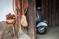 Barn find of old, rusty italian scooter in a hut Royalty Free Stock Photo