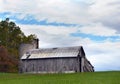 Barn on Hill With Roofless Silo Royalty Free Stock Photo