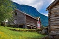 Old wooden barn and red house, Norway