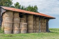 Barn with pile of haystacks in Normandy, France Royalty Free Stock Photo