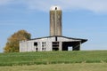 Barn and silo in armstrong county, 10 miles outside town Royalty Free Stock Photo