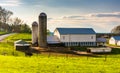 Barn and silo on a farm in rural York County, Pennsylvania. Royalty Free Stock Photo