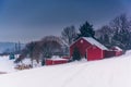 Barn on snow covered farm fields in rural York County, Pennsylvania. Royalty Free Stock Photo