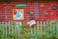 Barn Wall covered in Vintage Dust Pans, Rakes