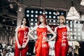 Barnaul, Russia - August 7, 2020. Fashion Mannequins in red overalls and text sale stand in shop window and attract Royalty Free Stock Photo