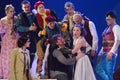 Theater actors in old costumes play in the play ` the taming of the shrew`