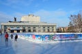 Barnaul, Russia, January, 13, 2016, Children skating on city ice rink in front of the Altay regional Drama theatre of Shukshin