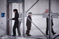 Prisoners in winter clothing in a maximum security prison