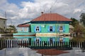 Flood. The river Ob, which emerged from the shores, flooded the outskirts of the city.Boats near the houses of residents.