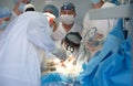 Heart surgeon performs open heart surgery