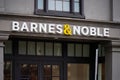 Barnes and Noble Booksellers small store with signage on city street