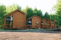 Barnhouse style houses. A street with cozy small houses. Modern construction