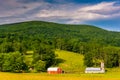 Barns and a mountain in the rural Potomac Highlands of West Virginia.