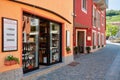 Barolo street with winery and typical bed and breakfast and food shop