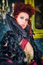 Baroness in baroque salon Royalty Free Stock Photo