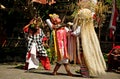 Barong and Kris dancer performing at the stage with their colorful costume