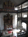Baroque altar in the two-story interior of a church in Maroldsweisach