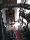 Baroque altar in the two-story interior of a church in Maroldsweisach