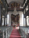 Baroque altar in the two-story interior of a church in Maroldsweisach