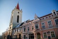 Baroque bell tower called Blatenska vez in winter, Narrow picturesque street, renaissance historical buildings with snow, Blatna