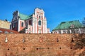 Baroque Catholic Church behind medieval defensive wal Royalty Free Stock Photo