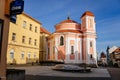 Baroque Chapel of Saint Florian and fountain with sundial, Narrow picturesque street, Church at the pedestrian zone in Kladno in s