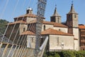 Baroque church with modern bridge. Cangas del Narcea, Asturias Royalty Free Stock Photo