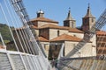 Baroque church with modern bridge. Cangas del Narcea, Asturias Royalty Free Stock Photo