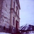 The baroque church of the village of Alvaneu in Switzerland shot with analogue film technique in winter