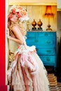 Baroque fashion blonde woman with flowers hat Royalty Free Stock Photo