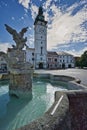 Baroque fountain in Vyskov town with City Hall tower