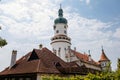 Baroque romantic castle Nove mesto nad Metuji with park, renaissance chateau, round white clock tower, red tile roof, Italian