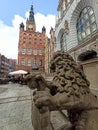 Baroque stone lion holding the city coat of arms in Long Lane or Dluga Street, Gdansk, Poland Royalty Free Stock Photo