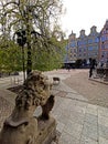 Baroque stone lion holding the city coat of arms in Long Lane or Dluga Street, Gdansk, Poland Royalty Free Stock Photo