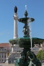 Baroque Style Fountain and Column of Pedro IV in Rossio Square in Lisbon, Portugal Royalty Free Stock Photo