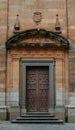 Baroque-style wooden door to a church in the historic centre of Salamanca, Spain Royalty Free Stock Photo