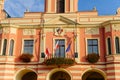 Baroque town hall at main Peace square of historic medieval royal town Melnik in sunny autumn day, forged balcony with flags and Royalty Free Stock Photo