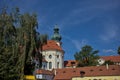 Baroque white benedictine monastery Brevnov with church.