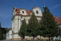 Baroque white benedictine monastery Brevnov with church.